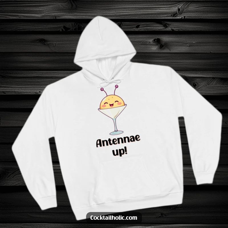 Funny hoodie depicting a happy, round creature with antennae wiggling from a martini glass, a warm and amusing apparel.